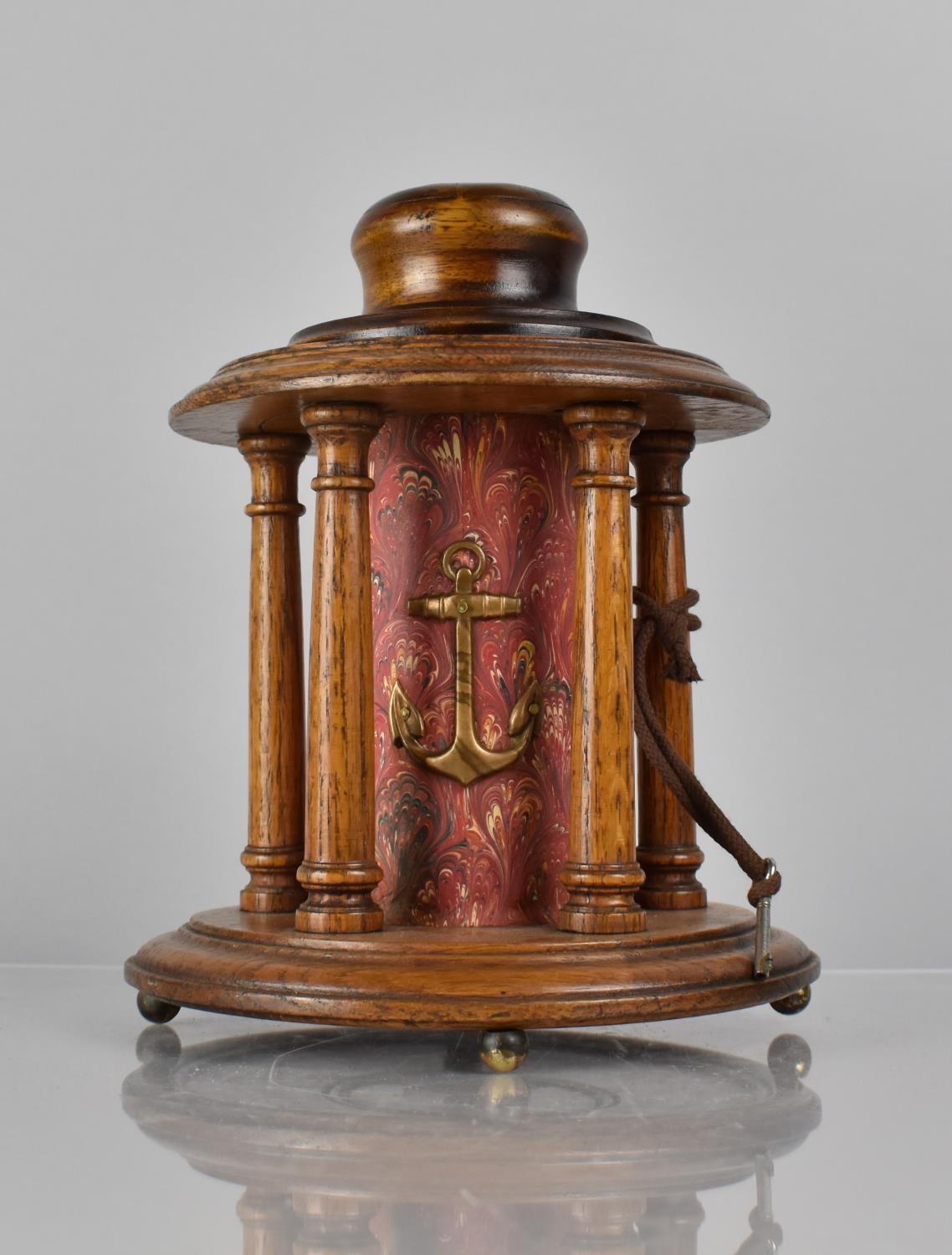 A Late Victorian Oak Seaman's or Naval Charity Box of Circular Form, the Centre Cylindrical Coin