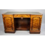 A Late Victorian Walnut Kneehole Writing Desk with Tooled Green Leather Writing Surface, Inverted