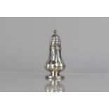 A Silver Pepper Pot, London 1837, 10cms High