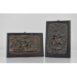 A Pair of Relief Bronze Plaques depicting Classical Scenes Mounted on Rectangular Ebonised