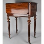 A Victorian Mahogany Drop Leaf Work Table, The Rectangular Top with Drop Leaves having Rounded