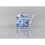 An 18th Century Chinese Blue and White Export Teapot, The Lid with Berry Finial, Body Decorated with