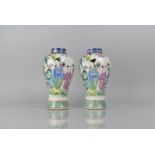 A Pair of Chinese Porcelain Vases of Baluster Form Decorated with Robed Mother and Children in