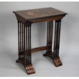 A Rosewood Quartetto Nest of Four Tables with Turned Spindle Supports and Inlaid Tops