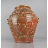 An 18th Century Italian Terracotta Slipware Wet Drug Jar Inscribed 'Sig. Romualdo Mazzinghi 1795'.