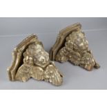 A Pair of 20th Century Lead Plaster Cast Corbels Modelled as Baroque Winged Cherubs 13x22x21cms High