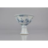 A Chinese Porcelain Blue and White Stem Cup decorated with Children at Play in Garden Setting,