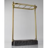 An Early 20th Century Brass Four Section Stick Stand with Iron Base and Drip Tray, 36cms Wide and