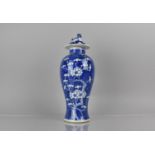 A 19th Century Chinese Porcelain Blue and White Prunus Pattern Baluster Vase and Cover, Double