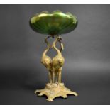 An Austrian Art Nouveau Table Centre, Moulded Iridescent Green Glass Bowl Supported on Patinated