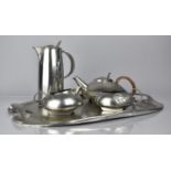 Archibald Knox for Liberty and Co., A Tudric Pewter Five Piece Tea Service, Model 0231, To