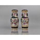 A Pair of Chinese Nanking Crackle Glazed Vases decorated in the Famille Rose Palette with Battle