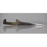 A 19th century Indo Persian Stiletto Blade Dagger with Brass Handle having Inlaid Wooden Scales with