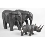 Three African Carved Wooden Souvenirs, Two Elephants and a Rhino, Elephants 23cms Long