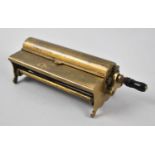 A Vintage Brass Cigarette Rolling Machine, The Concinnum, 13cms Wide