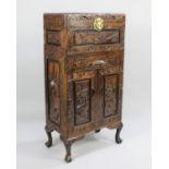 A Mid 20th Century Carved Oriental Box on Stand with Hinged Lid, Centre Long Drawer and Base