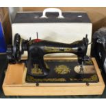 A Vintage Singer Sewing Machine with Carry Case
