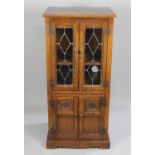 An Old Charm Media Cabinet with Lead Glazed Doors to Top Section, Base Cupboard with Two Small