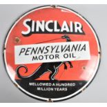 A Reproduction Circular American Enamel Sign for Sinclair Pennsylvania Motor Oil, 30cms Diameter