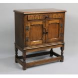 A Mid 20th Century Old Charm Side Cabinet with Single Drawer over Panelled Doors to Cupboard Base,