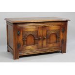 A Mid 20th century Old Charm Side Cabinet with Carved Panelled Doors, 81cms Wide