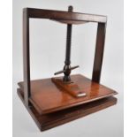 A Regency Mahogany Book Press, Probably Early 19th Century, Having Screw Rise and Fall Platform