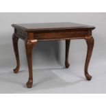 A Modern Mahogany Rectangular Topped Coffee Table on Carved and Moulded Cabriole Supports, 70cms