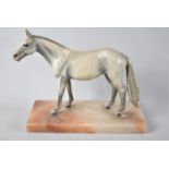 A Cold Painted Spelter Study of Racehorse on Onyx Plinth, Ear AF, 23cms Wide