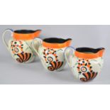 A Set of Three Graduated Arabesque Jugs by Soho Pottery