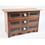 A Late 19th/ Early 20th Century Three Drawer Table Top Collectors Chest with Ceramic Handles,