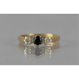 A 9ct Gold, Diamond and Sapphire Ring, 1.8gms