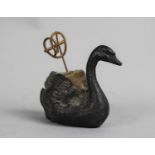 A Novelty Spelter Pin Cushion in the Form of a Swan having Staffordshire Knot Pin