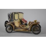 A Novelty Italian Ceramic Decanter in the Form of a 1908 Lanchester Motor Car, 24cms Long