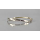 A Silver and CZ Hinged Bangle, 13.1gms Inner Dimensions 59mm by 51mm