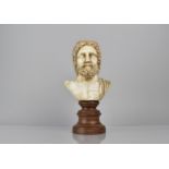 An Early 20th Century Plaster Museum Copy of a Classical Male Bust Mounted on a Turned Wooden Socle,