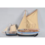 A Modern Wooden Model of a Fishing Barge together with a Small Example, Larger 32cms long