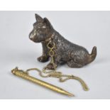 A Japanese Novelty Desktop Paperweight in the Form of Terrier with Chain Connecting to Small