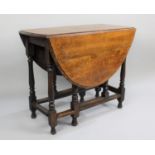 A Mid 20th Century Oak Drop Leaf Oval Top Gate Leg Dining Table, 80cms Wide