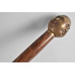 A Modern Turned Walking Cane with Buddha Four Faced Novelty Handle