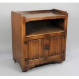 A Mid 20th Century Oak Music Cabinet by Old Charm with Linenfold Panelled Doors to Fitted