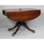 A Reproduction Drop Leaf Mahogany Centre Table on Four Scrolled Supports with Brass Terminal