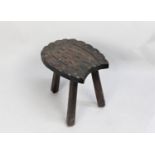 A Mid 20th Century Three Legged Stool with Carved Top in the Shape of a Horseshoe, 35cm wide