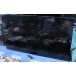 A Very Large Wall Mounting Samsung 83" TV with Remote, Working Order
