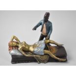 A Reproduction Cold Painted Bronze Erotic Figure Group in the Manner of Bergmann, Magician