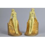 A Pair of Cast Resin Art Deco Style Bookends in the Form of Two Nudes Standing on Shells, 24cm high