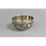 A Small Indian White Metal Bowl Decorated in Relief with Native Animals in the Round with Centre