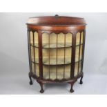 An Edwardian Mahogany Bow Fronted and Galleried Two Shelf Display Cabinet on Short Cabriole Supports