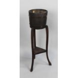 A Mid 20th Century Wooden Circular Planter on Tripod Stand with Stretcher Shelf, 26cm diameter and