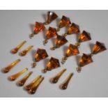 A Collection of Amber Coloured Glass Bead Droppers