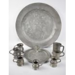 A Collection of Various Pewter Measures, Tankard and Large Charger, 46cm Diameter
